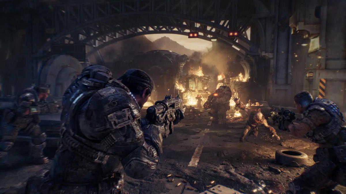 جنود يرتدون دروعاً ثقيلة يقاتلون وحوشاً في بيئة حضارية مدمرة من لعبة Gears of War: E-Day.